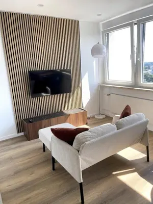 TV/Unterhaltungsangebot in der Unterkunft City Loft mit Balkonblick