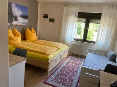 Ein Bett oder Betten in einem Zimmer der Unterkunft Pension Casa Rosa