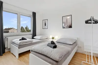 Ein Bett oder Betten in einem Zimmer der Unterkunft MONTEUR - Unterkunft für bis zu 5 Personen in 64546 Mörfelden-Walldorf - GG11