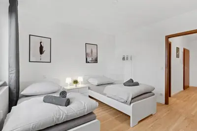 Ein Bett oder Betten in einem Zimmer der Unterkunft MONTEUR - Unterkunft für bis zu 5 Personen in 64546 Mörfelden-Walldorf - GG11