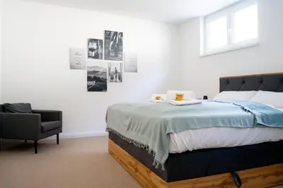 Ein Bett oder Betten in einem Zimmer der Unterkunft VINOKAT Living - Exklusiv - Top Lage