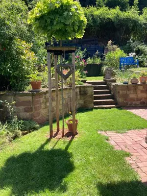 Ein Garten an der Unterkunft Ferienwohnung mit Weitblick