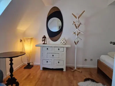 Ein Bett oder Betten in einem Zimmer der Unterkunft Ferienhaus Anna mit Kamin, Terrasse, Hof & Garage