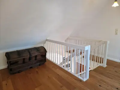Ein Bett oder Betten in einem Zimmer der Unterkunft Ferienhaus Lisette Wohlfühldomizil zwischen Rebenmeer und Pfälzer Wald