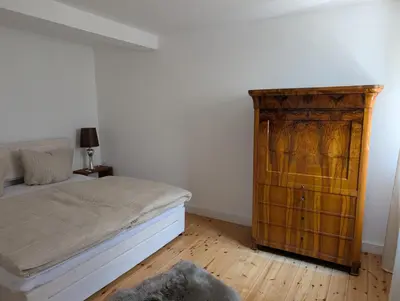 Ein Bett oder Betten in einem Zimmer der Unterkunft Ferienhaus Lisette Wohlfühldomizil zwischen Rebenmeer und Pfälzer Wald