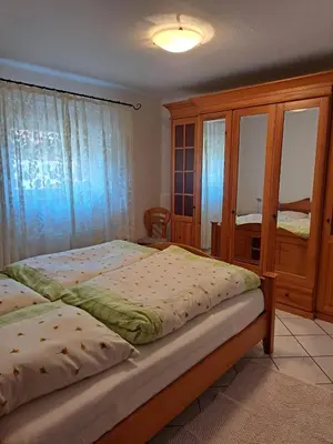 Ein Bett oder Betten in einem Zimmer der Unterkunft Ferienwohnung Grasmück