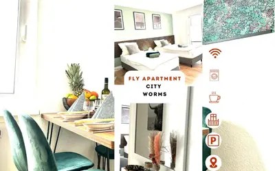 Ein Bett oder Betten in einem Zimmer der Unterkunft CityapartmentWorms, urbaner Rückzugsort
