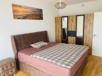 Ein Bett oder Betten in einem Zimmer der Unterkunft InterAssist 15