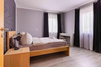 Ein Bett oder Betten in einem Zimmer der Unterkunft Ferienwohnung Dominique