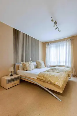 Ein Bett oder Betten in einem Zimmer der Unterkunft Ferienwohnung Dominique