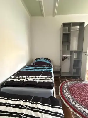 Ein Bett oder Betten in einem Zimmer der Unterkunft Monteur- und Ferienwohnung Ketsch