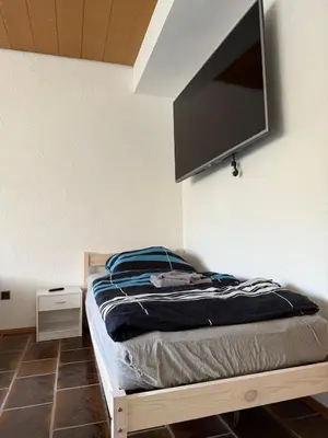 Ein Bett oder Betten in einem Zimmer der Unterkunft Monteur- und Ferienwohnung Ketsch