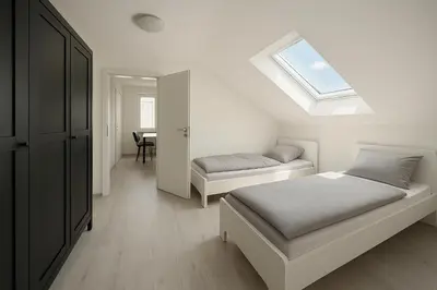 Ein Bett oder Betten in einem Zimmer der Unterkunft Monteur- und Ferienwohnung Rheinhausen - Lönsweg
