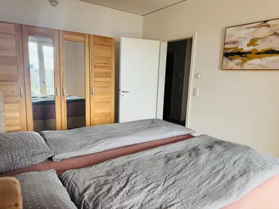 Ein Bett oder Betten in einem Zimmer der Unterkunft InterAssist 14
