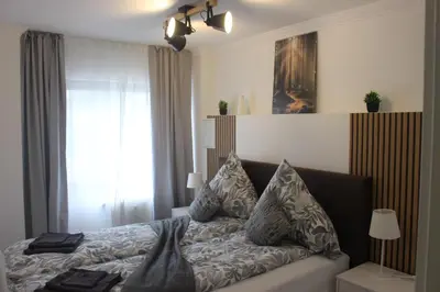 Ein Sitzbereich in der Unterkunft Wunderschöne 3-Zimmer Hilton Appartment Style - Ideal for Business and Family Trips