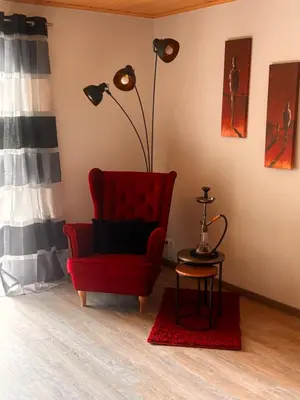 Ein Sitzbereich in der Unterkunft Ferienwohnung Schwegenheim 
