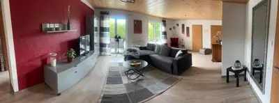 Ein Sitzbereich in der Unterkunft Ferienwohnung Schwegenheim 