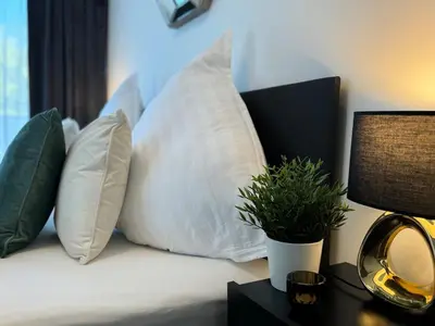 Ein Bett oder Betten in einem Zimmer der Unterkunft Karlsruhe Finest Apartment 2