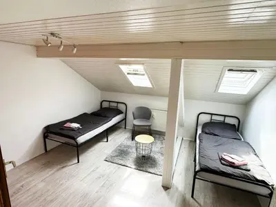 Ein Bett oder Betten in einem Zimmer der Unterkunft Comfort Stay Apartment in Rüsselsheim am Main