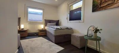 Ein Bett oder Betten in einem Zimmer der Unterkunft Fewo Rehblick im Wander und Mountainbike Paradies Odenwald