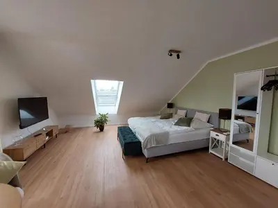 Ein Bett oder Betten in einem Zimmer der Unterkunft Apartment Senfnest