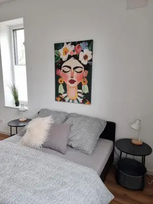 Ein Bett oder Betten in einem Zimmer der Unterkunft 1-Zimmer-Loft Casa Frida