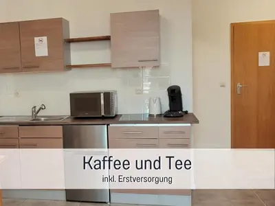 Küche/Küchenzeile in der Unterkunft City-Apartment Germersheim