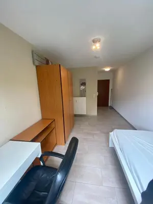 Ein Bett oder Betten in einem Zimmer der Unterkunft Apartment in Karlsruhe Neureut
