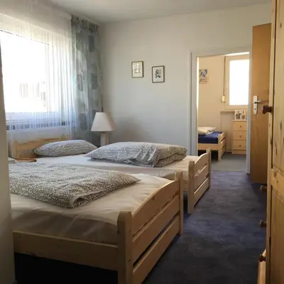 Ein Bett oder Betten in einem Zimmer der Unterkunft Apartment Hope Inn