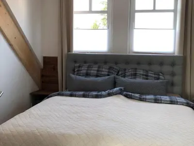 Ein Bett oder Betten in einem Zimmer der Unterkunft Wunderschönes Apartment im Eckhaus3