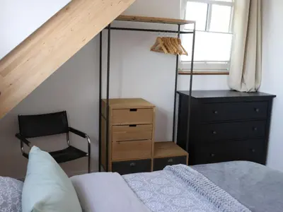 Ein Bett oder Betten in einem Zimmer der Unterkunft Wunderschönes Apartment im Eckhaus3