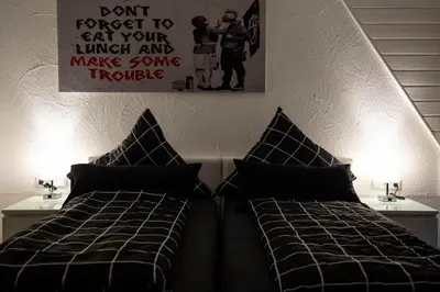 Ein Bett oder Betten in einem Zimmer der Unterkunft NECKARWESTHEIMER Hotel