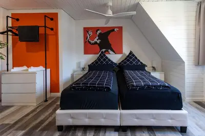Ein Bett oder Betten in einem Zimmer der Unterkunft NECKARWESTHEIMER Hotel