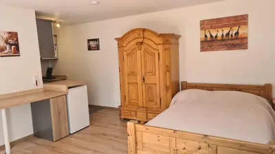 Ein Bett oder Betten in einem Zimmer der Unterkunft Haides helle Wohnung