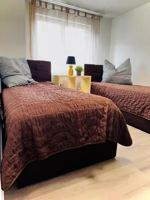 Ein Bett oder Betten in einem Zimmer der Unterkunft SRooms - Neckarwestheim
