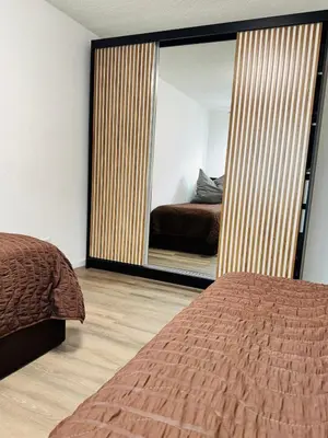 Ein Bett oder Betten in einem Zimmer der Unterkunft SRooms - Neckarwestheim