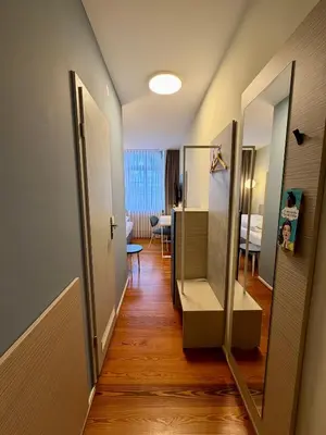 Ein Bett oder Betten in einem Zimmer der Unterkunft Hotel Am Kornmarkt