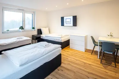 Ein Bett oder Betten in einem Zimmer der Unterkunft Montelio Living