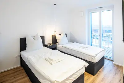 Ein Bett oder Betten in einem Zimmer der Unterkunft Montelio Living