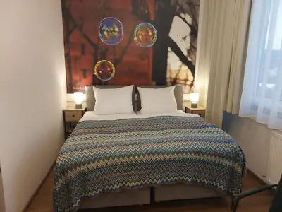 Ein Bett oder Betten in einem Zimmer der Unterkunft Renatus Apartments