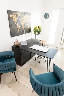 Ein Sitzbereich in der Unterkunft Renatus Apartments