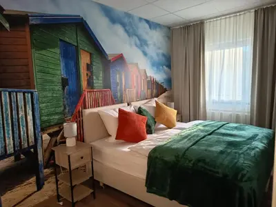 Ein Bett oder Betten in einem Zimmer der Unterkunft Renatus Apartments
