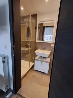 Ein Badezimmer in der Unterkunft Boardinghouse Wildbachtal
