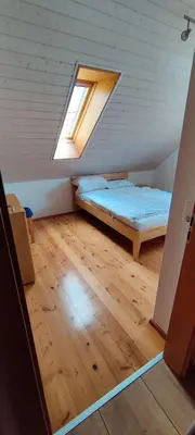 Ein Bett oder Betten in einem Zimmer der Unterkunft Ferienwohnung Hennrich