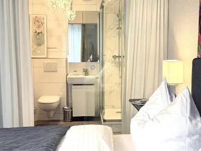 Ein Badezimmer in der Unterkunft Dompanorama PAPAGENO 1-Zimmer Apartment für 2 Gäste