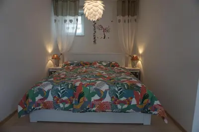 Ein Bett oder Betten in einem Zimmer der Unterkunft Ferienwohnung Udenheim