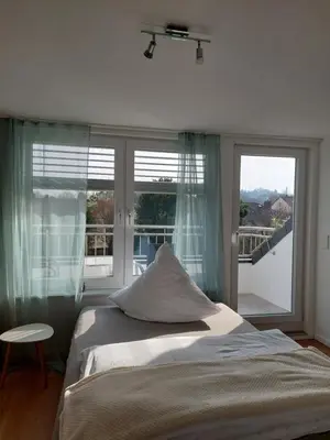 Ein Bett oder Betten in einem Zimmer der Unterkunft Ferienwohnung Senfnest