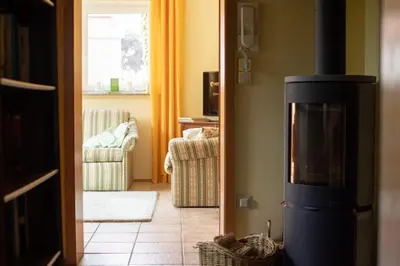Ein Bett oder Betten in einem Zimmer der Unterkunft Marita's Gartenparadies