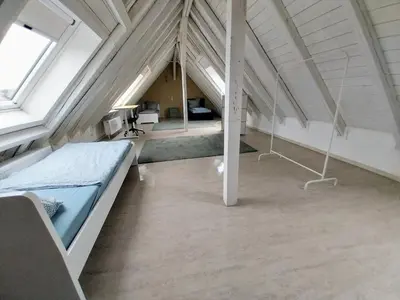 Ein Bett oder Betten in einem Zimmer der Unterkunft Monteurwohnung - Bertholdstraße 19
