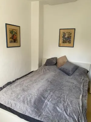 Ein Bett oder Betten in einem Zimmer der Unterkunft Haus Stoll